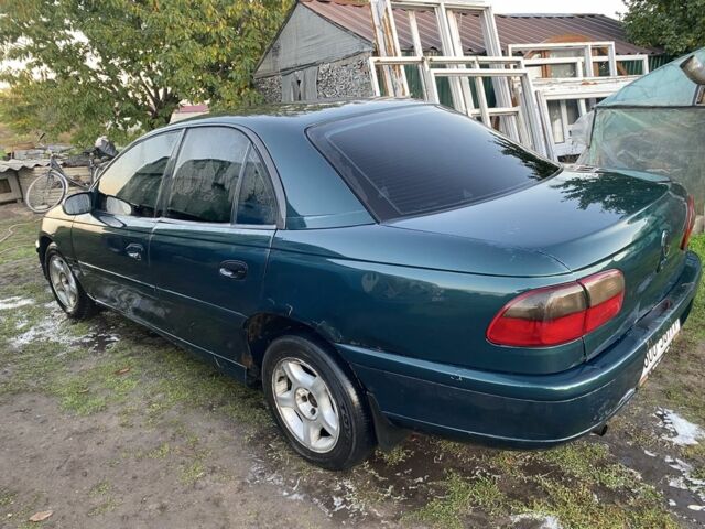 Зелений Опель Омега, об'ємом двигуна 2 л та пробігом 439 тис. км за 1069 $, фото 1 на Automoto.ua