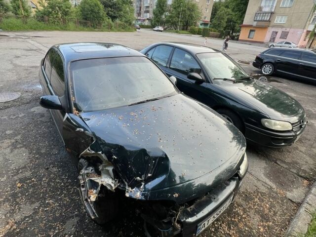 Зелений Опель Омега, об'ємом двигуна 2 л та пробігом 400 тис. км за 600 $, фото 1 на Automoto.ua