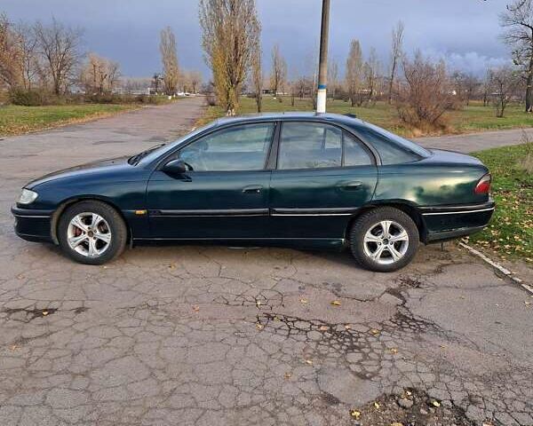 Зеленый Опель Омега, объемом двигателя 2 л и пробегом 280 тыс. км за 1950 $, фото 2 на Automoto.ua