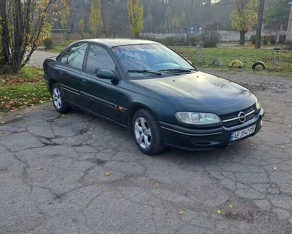 Зеленый Опель Омега, объемом двигателя 2 л и пробегом 280 тыс. км за 1950 $, фото 7 на Automoto.ua