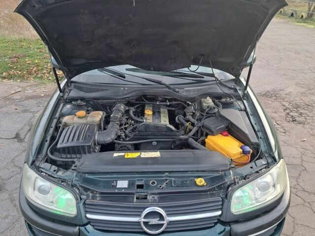 Зеленый Опель Омега, объемом двигателя 2 л и пробегом 280 тыс. км за 1950 $, фото 13 на Automoto.ua