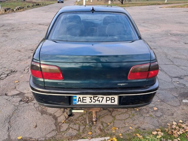 Зеленый Опель Омега, объемом двигателя 2 л и пробегом 280 тыс. км за 1950 $, фото 4 на Automoto.ua