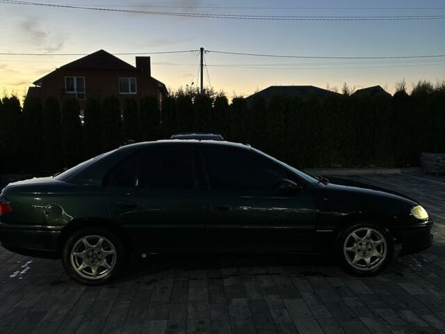 Зеленый Опель Омега, объемом двигателя 2 л и пробегом 250 тыс. км за 1400 $, фото 4 на Automoto.ua