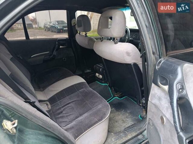 Зеленый Опель Омега, объемом двигателя 2 л и пробегом 321 тыс. км за 1100 $, фото 13 на Automoto.ua