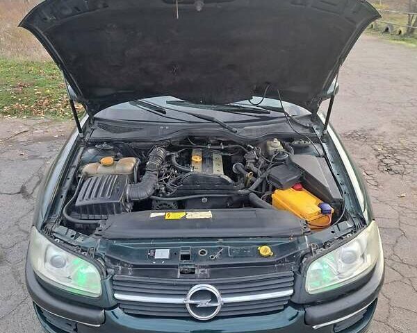 Зеленый Опель Омега, объемом двигателя 2 л и пробегом 280 тыс. км за 1950 $, фото 13 на Automoto.ua