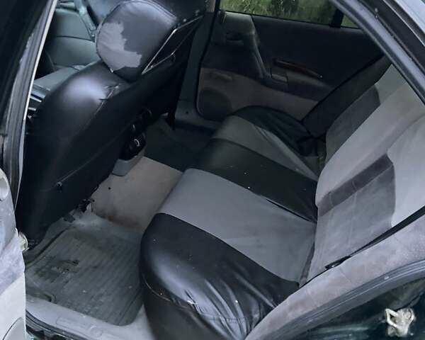 Зеленый Опель Омега, объемом двигателя 2 л и пробегом 339 тыс. км за 1250 $, фото 4 на Automoto.ua