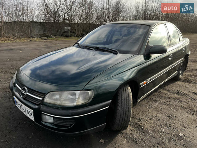 Зелений Опель Омега, об'ємом двигуна 2.96 л та пробігом 300 тис. км за 1350 $, фото 3 на Automoto.ua