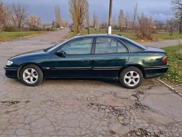 Зеленый Опель Омега, объемом двигателя 2 л и пробегом 280 тыс. км за 1950 $, фото 2 на Automoto.ua