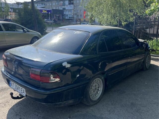 Зелений Опель Омега, об'ємом двигуна 2 л та пробігом 400 тис. км за 600 $, фото 5 на Automoto.ua