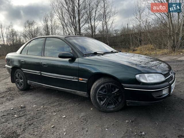 Зелений Опель Омега, об'ємом двигуна 2.96 л та пробігом 300 тис. км за 1350 $, фото 13 на Automoto.ua
