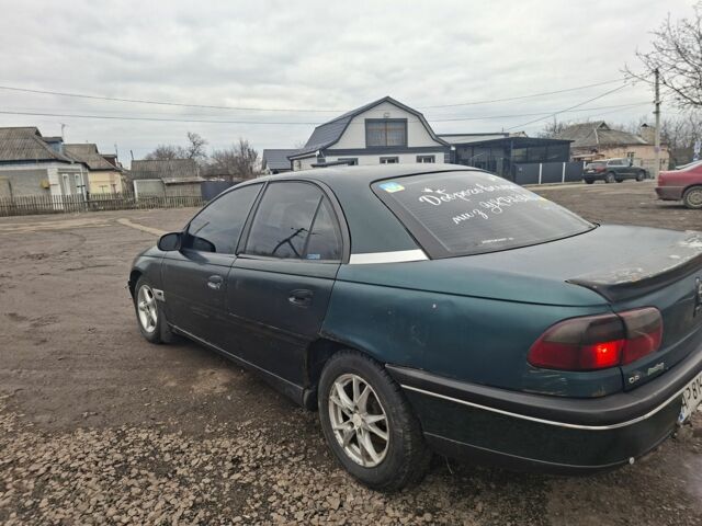 Зеленый Опель Омега, объемом двигателя 2 л и пробегом 189 тыс. км за 700 $, фото 2 на Automoto.ua