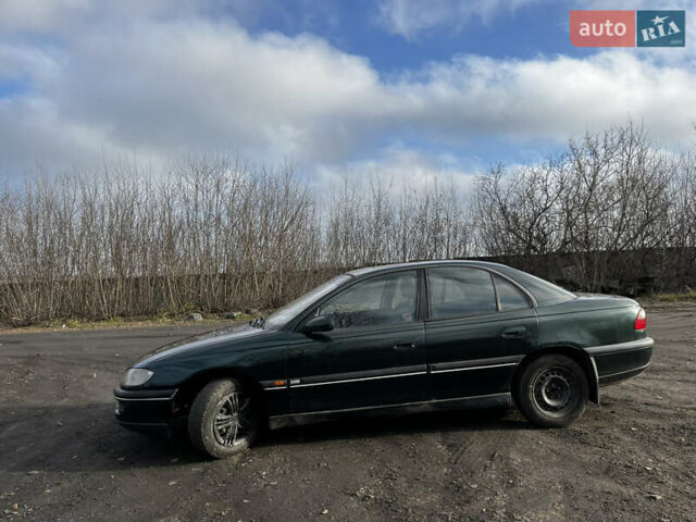 Зелений Опель Омега, об'ємом двигуна 2.96 л та пробігом 300 тис. км за 1350 $, фото 5 на Automoto.ua