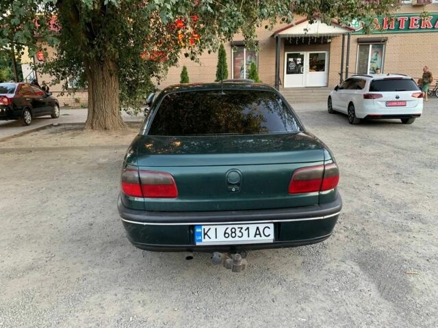 Зеленый Опель Омега, объемом двигателя 2 л и пробегом 300 тыс. км за 1600 $, фото 1 на Automoto.ua