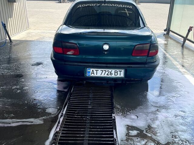 Зелений Опель Омега, об'ємом двигуна 2 л та пробігом 300 тис. км за 1600 $, фото 5 на Automoto.ua