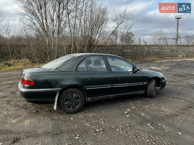 Зелений Опель Омега, об'ємом двигуна 2.96 л та пробігом 300 тис. км за 1350 $, фото 11 на Automoto.ua