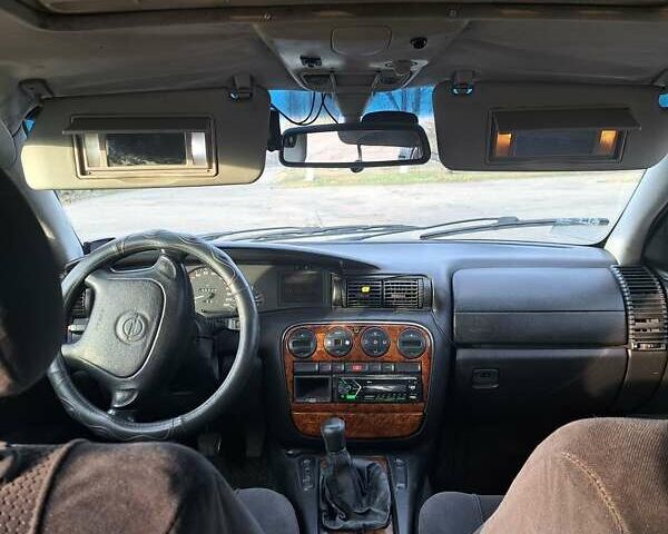 Зелений Опель Омега, об'ємом двигуна 2 л та пробігом 280 тис. км за 1899 $, фото 15 на Automoto.ua