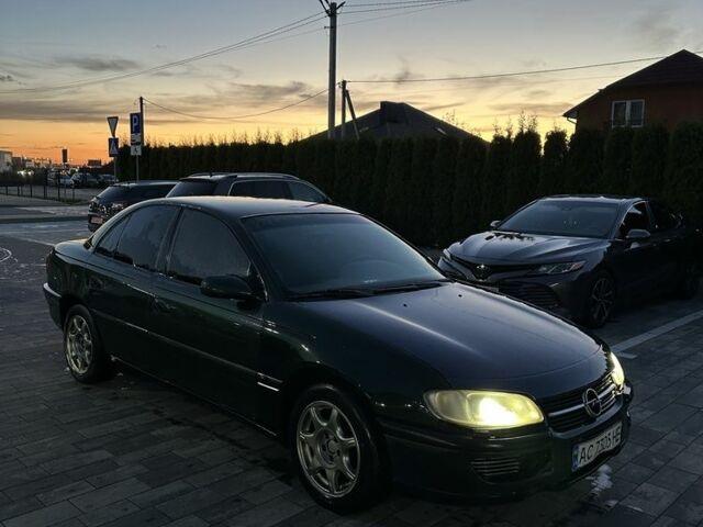 Зеленый Опель Омега, объемом двигателя 2 л и пробегом 250 тыс. км за 1400 $, фото 6 на Automoto.ua