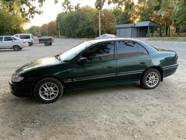 Зеленый Опель Омега, объемом двигателя 2 л и пробегом 300 тыс. км за 1600 $, фото 6 на Automoto.ua