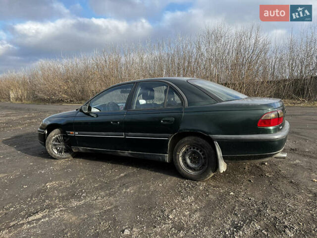 Зелений Опель Омега, об'ємом двигуна 2.96 л та пробігом 300 тис. км за 1350 $, фото 6 на Automoto.ua