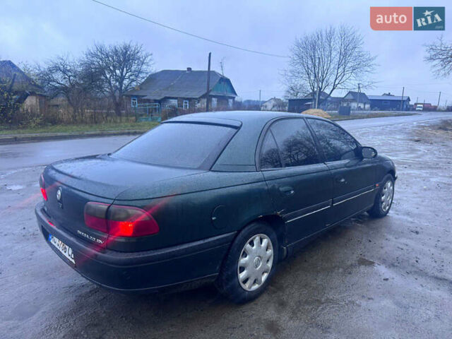 Зелений Опель Омега, об'ємом двигуна 2 л та пробігом 370 тис. км за 1250 $, фото 2 на Automoto.ua