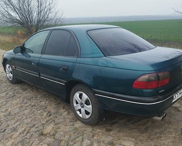 Зеленый Опель Омега, объемом двигателя 2.5 л и пробегом 450 тыс. км за 1800 $, фото 1 на Automoto.ua