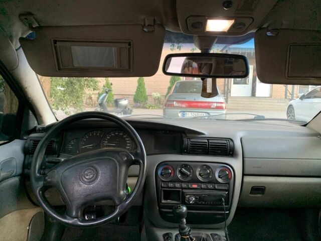 Зеленый Опель Омега, объемом двигателя 2 л и пробегом 300 тыс. км за 1600 $, фото 2 на Automoto.ua