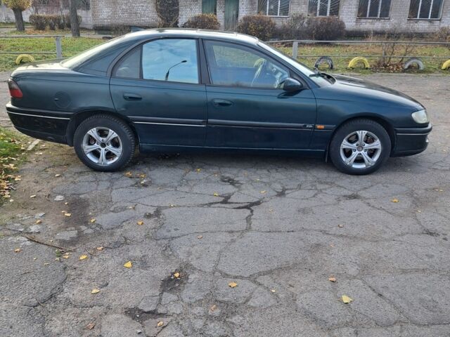 Зеленый Опель Омега, объемом двигателя 2 л и пробегом 280 тыс. км за 1950 $, фото 6 на Automoto.ua