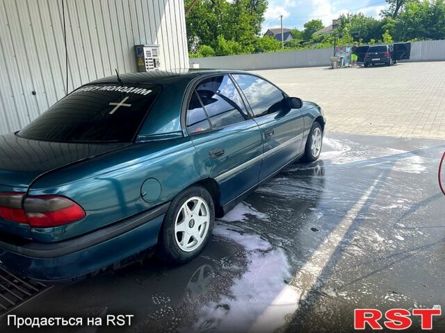 Зелений Опель Омега, об'ємом двигуна 2 л та пробігом 300 тис. км за 1600 $, фото 4 на Automoto.ua