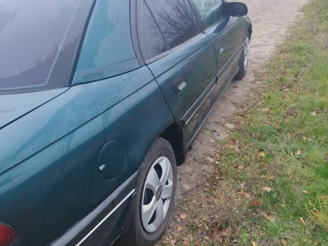 Зеленый Опель Омега, объемом двигателя 2.5 л и пробегом 450 тыс. км за 1904 $, фото 3 на Automoto.ua