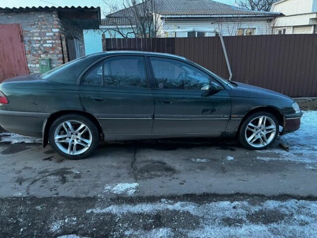 Зелений Опель Омега, об'ємом двигуна 3 л та пробігом 3 тис. км за 1000 $, фото 5 на Automoto.ua