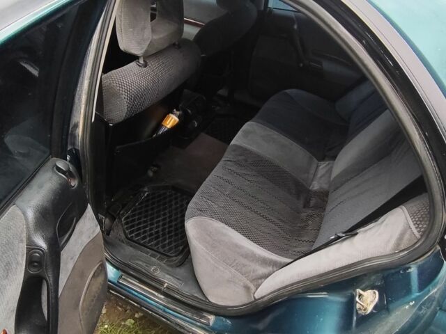 Зеленый Опель Омега, объемом двигателя 2 л и пробегом 343 тыс. км за 2500 $, фото 6 на Automoto.ua