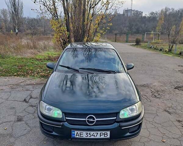 Зелений Опель Омега, об'ємом двигуна 2 л та пробігом 280 тис. км за 1899 $, фото 8 на Automoto.ua