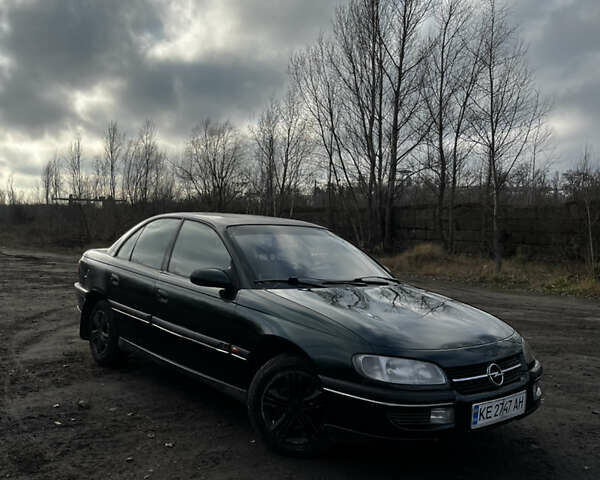 Зелений Опель Омега, об'ємом двигуна 2.96 л та пробігом 300 тис. км за 1350 $, фото 14 на Automoto.ua