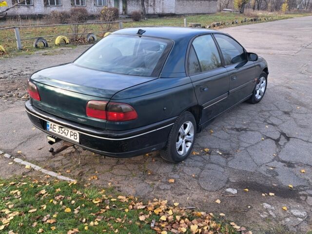 Зеленый Опель Омега, объемом двигателя 2 л и пробегом 280 тыс. км за 1950 $, фото 5 на Automoto.ua