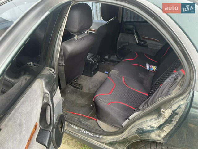 Зелений Опель Омега, об'ємом двигуна 2 л та пробігом 306 тис. км за 1500 $, фото 6 на Automoto.ua