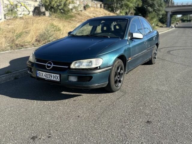 Зеленый Опель Омега, объемом двигателя 2 л и пробегом 200 тыс. км за 850 $, фото 3 на Automoto.ua