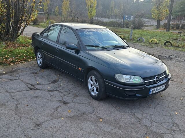 Зеленый Опель Омега, объемом двигателя 2 л и пробегом 280 тыс. км за 1950 $, фото 7 на Automoto.ua