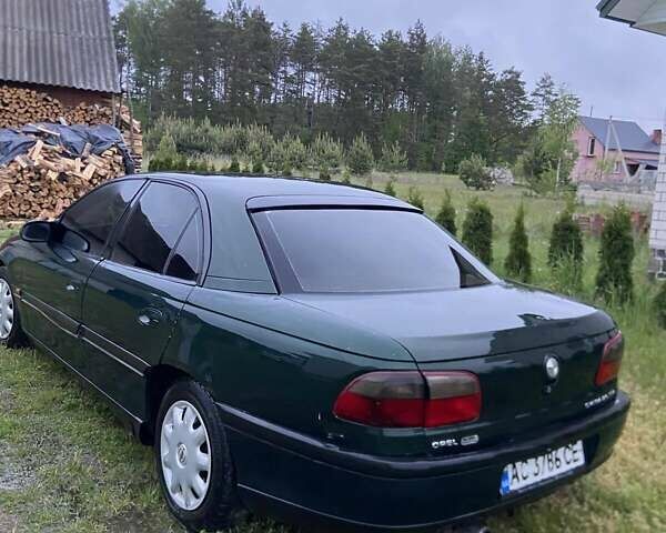 Зеленый Опель Омега, объемом двигателя 2 л и пробегом 339 тыс. км за 1250 $, фото 2 на Automoto.ua