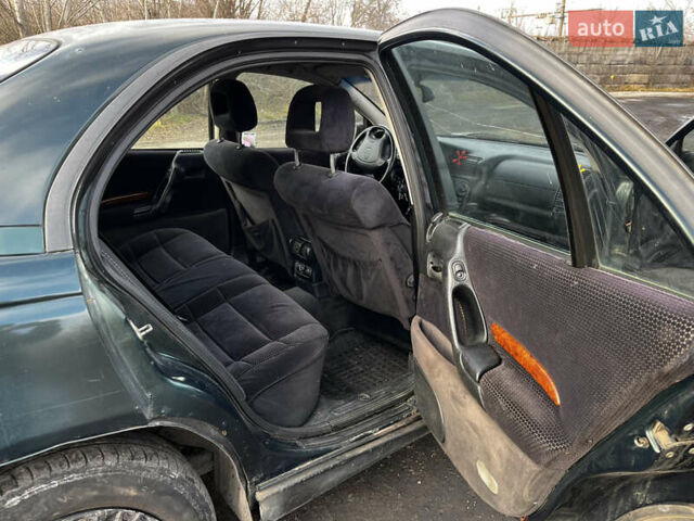 Зелений Опель Омега, об'ємом двигуна 2.96 л та пробігом 300 тис. км за 1350 $, фото 17 на Automoto.ua