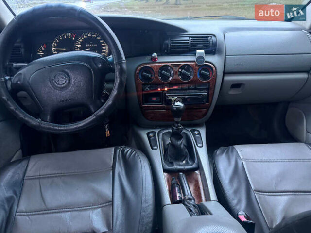 Зелений Опель Омега, об'ємом двигуна 2 л та пробігом 370 тис. км за 1250 $, фото 5 на Automoto.ua