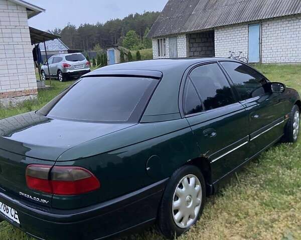Зеленый Опель Омега, объемом двигателя 2 л и пробегом 339 тыс. км за 1250 $, фото 1 на Automoto.ua