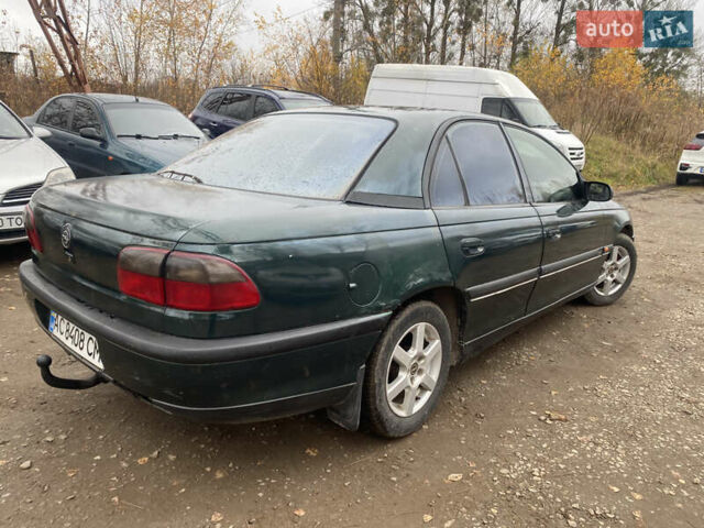 Зелений Опель Омега, об'ємом двигуна 2 л та пробігом 300 тис. км за 1300 $, фото 3 на Automoto.ua