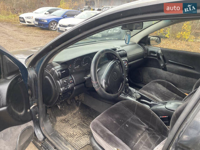 Зелений Опель Омега, об'ємом двигуна 2 л та пробігом 300 тис. км за 1300 $, фото 2 на Automoto.ua