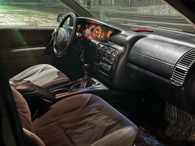 Зелений Опель Омега, об'ємом двигуна 2 л та пробігом 306 тис. км за 1450 $, фото 1 на Automoto.ua