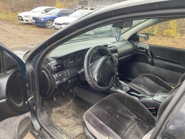 Зеленый Опель Омега, объемом двигателя 2 л и пробегом 200 тыс. км за 1300 $, фото 1 на Automoto.ua