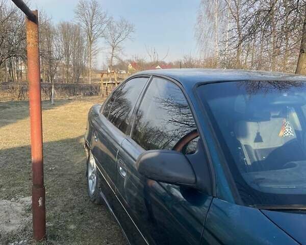 Зеленый Опель Омега, объемом двигателя 2 л и пробегом 354 тыс. км за 1199 $, фото 3 на Automoto.ua