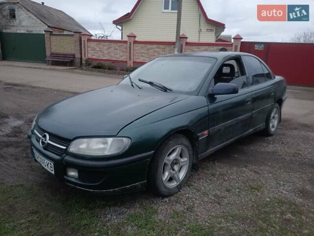 Зеленый Опель Омега, объемом двигателя 2 л и пробегом 400 тыс. км за 850 $, фото 1 на Automoto.ua