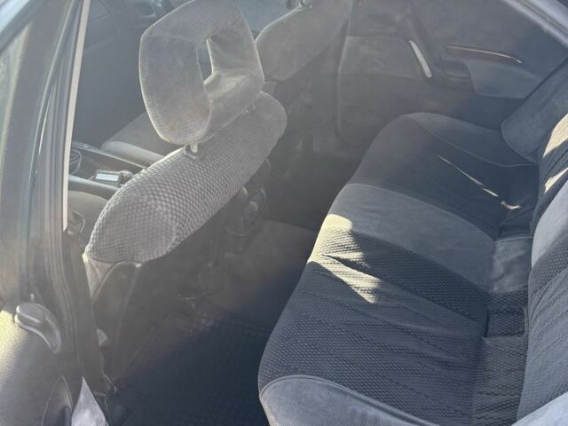 Зеленый Опель Омега, объемом двигателя 2.5 л и пробегом 300 тыс. км за 2500 $, фото 10 на Automoto.ua