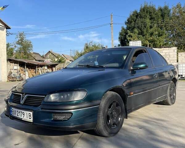 Зеленый Опель Омега, объемом двигателя 2 л и пробегом 300 тыс. км за 1800 $, фото 1 на Automoto.ua