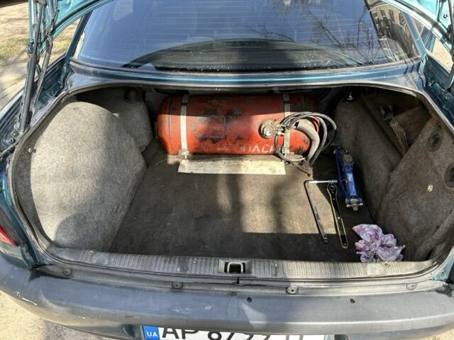 Зеленый Опель Омега, объемом двигателя 2 л и пробегом 302 тыс. км за 3000 $, фото 5 на Automoto.ua